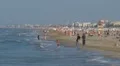 Timelapse People relaxing and walking on the beach, Rimini, Italy, HD Footage