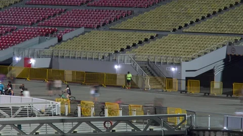 Timelapse of people walking by the Float, Singapore at night Stock Footage 165344729