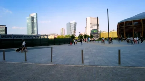 Timelapse of people walking in Piazza Gae Aulenti on a summer afternoon Stock Footage 155653355