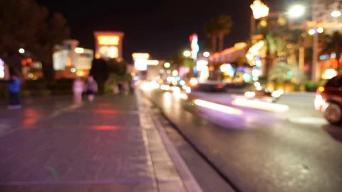 Timelapse of people walking through Las Vegas at night out of focus Stock Footage 88026850