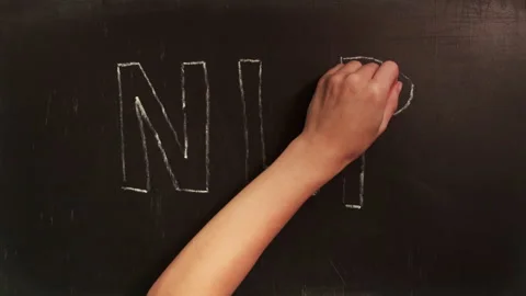 Timelapse of a person hand writes abbreviation NLP on blackboard with white Stock Footage 224124866