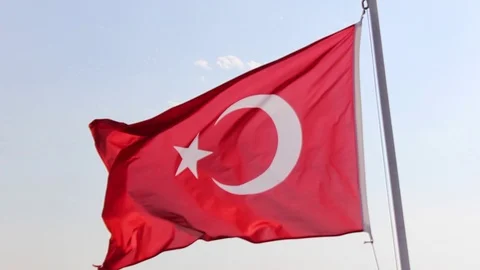Timelapse perspective far video shot of colorful waving turkish flag with blu Stock Footage 92015965