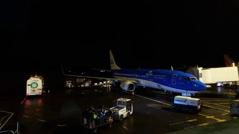 Timelapse of plane loading baggage at Edinburgh Airport Stock Footage 77615967