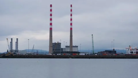 Timelapse of Poolbeg Generating Station and Dublin Port on a Cloudy Day Stock Footage 328804127