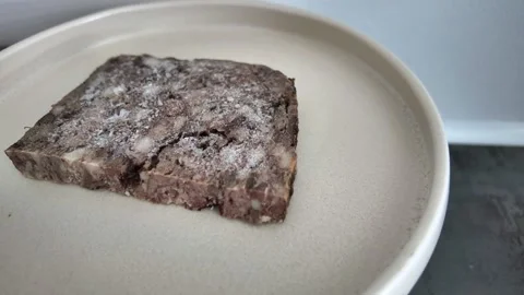 Timelapse of pork pâté defrosting in kitchen 스톡 동영상 342985248