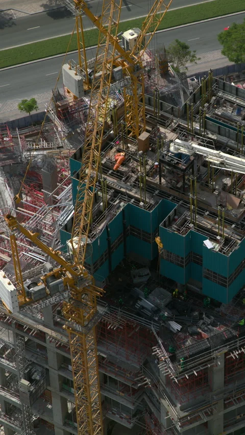 Timelapse of Potain tower cranes on a Dubai skyscraper construction site Stock Footage 340448721