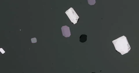 Timelapse of Potassium hydrogen tartrate crystallization under polarized light Stock Footage 116873243