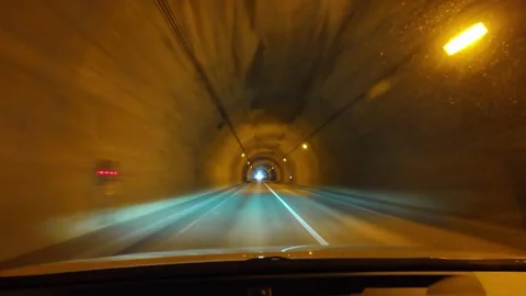 Timelapse POV Driving Through Highway Tunnel in Tomamu Hokkaido Japan Vídeo Stock 333588564