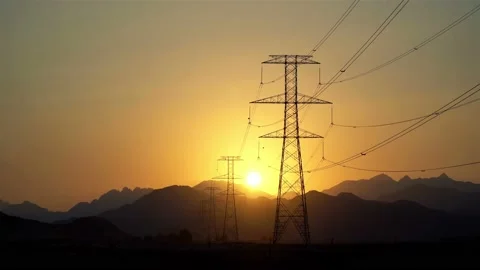 Timelapse of Power Line High Voltage Electricity Pylons at Sunset. 4K Video Clip Stock Footage 100332013