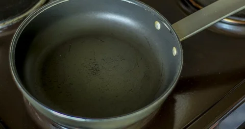 Timelapse of the process of creating a delicious and appetizing fried eggs Stock-Footage 129594546