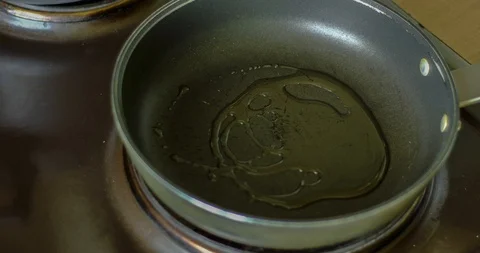 Timelapse of the process of creating a delicious and appetizing fried eggs Stock-Footage 129594806