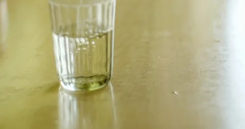 Timelapse of the process of pouring boiling water and preparing delicious tea Stock-Footage 129594760