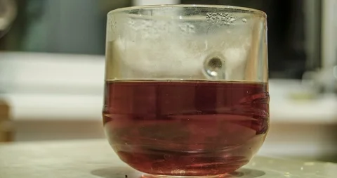 Timelapse of the process of pouring boiling water and preparing delicious tea Stock-Footage 129601263