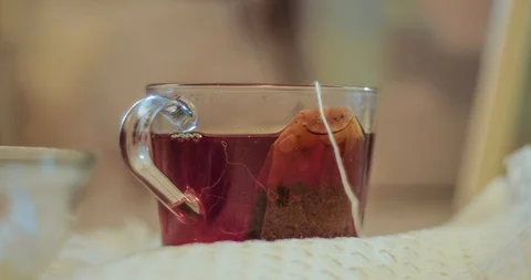 Timelapse of the process of pouring boiling water and preparing delicious tea Stock-Footage 129601318