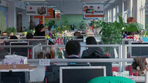 Timelapse Of Professionals Working At Desks In An Office, Beijing China Stock Footage 140484712