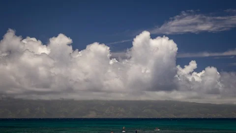 Timelapse of Puffy Clouds Building Up Over Molokai from Maui Stock Footage 128995973