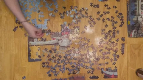 A Timelapse of a Puzzle Assembly Stock Footage 144397206