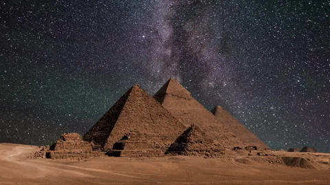 Timelapse of Pyramid complex of Giza at night. Giza, Cairo, Egypt Stock Footage 246813416