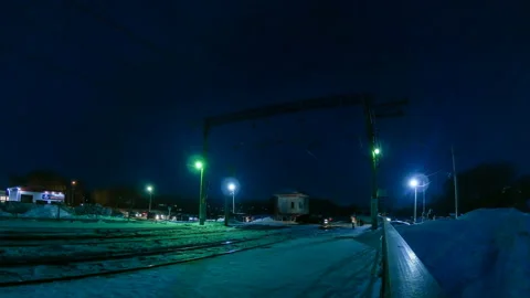 Timelapse of a railway, a train with a stop platform Vídeos de archivo 129611075