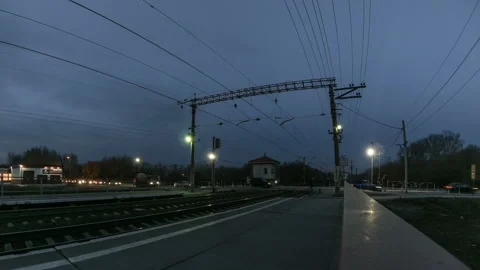 Timelapse of a railway, a train with a stop platform Vídeos de archivo 129611133