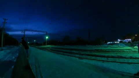 Timelapse of a railway, a train with a stop platform Stock-Footage 129611193