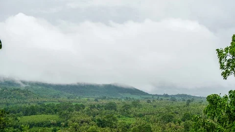 Timelapse of Rain Clouds Moving Over Hills Video stock 71278330