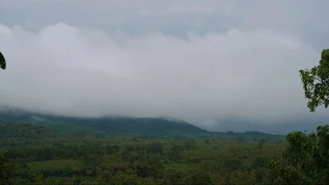 Timelapse of Rain Clouds Moving Over Hills Stock Footage 71423393