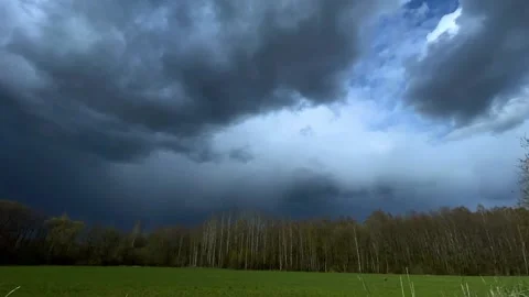 Timelapse of rain clouds over the forest 스톡 동영상 153041915