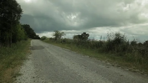 Timelapse rain clouds over village road Stock-Footage 75268322