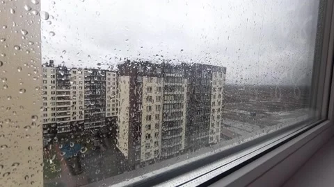 Timelapse of rain outside the window Video stock 165995705