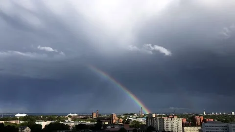 Timelapse of rainbow over city Stock Footage 142192565