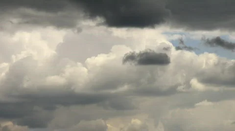 Timelapse rainclouds flying in summer sky Stock Footage