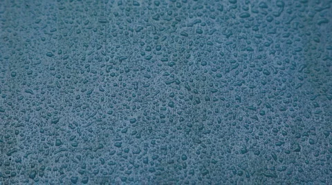Timelapse raindrops on blue surface Stock Footage 2288468