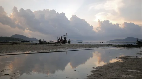 Timelapse rainy cloud above island in sea,thai national flag on long tail fis Stock Footage 128315530