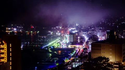 Timelapse of a rainy night view over downtown Atami, Japan Stock Footage 156786426