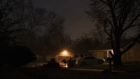Timelapse of Rainy Sunrise in Suburban Neighborhood Stock Footage