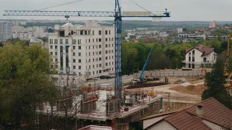 Timelapse of a residential building under construction with a tower crane Stock Footage 345519709
