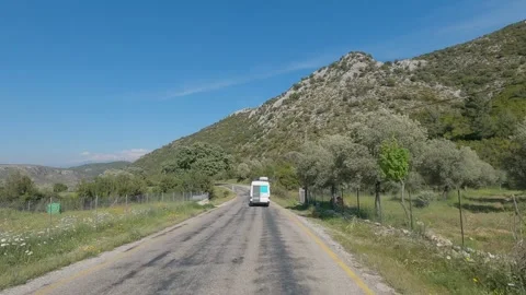Timelapse of retro camper van driving on a scenic road in the interior of Turkey Stock Footage 321095944