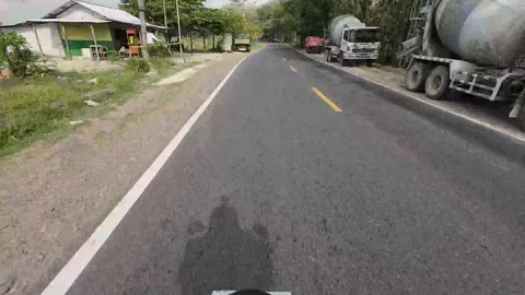 Timelapse of Riding passing through the small town in Central Java, Indonesia Stock Footage 316877362