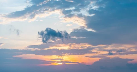 Timelapse of rising sun on the sky with clouds Stock Footage 129502449