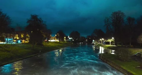Timelapse of the river Cam flowing through Cambridge town center, late at nig Stock Footage 153312644