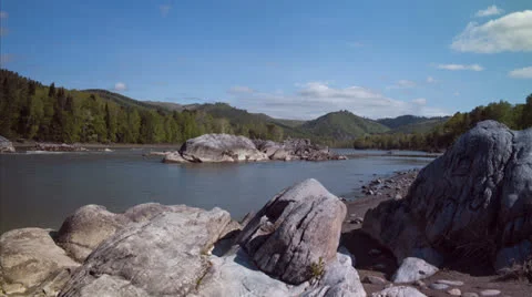 Timelapse river with stone under blue sky with clouds Stock Footage 24263920