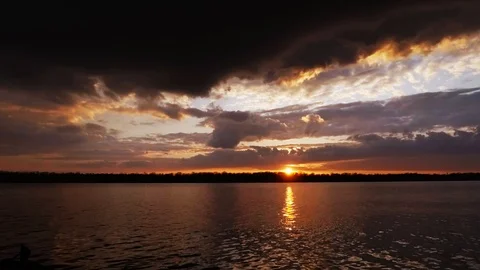 Timelapse on the river sunset and clouds in the sky Stock Footage 125978993