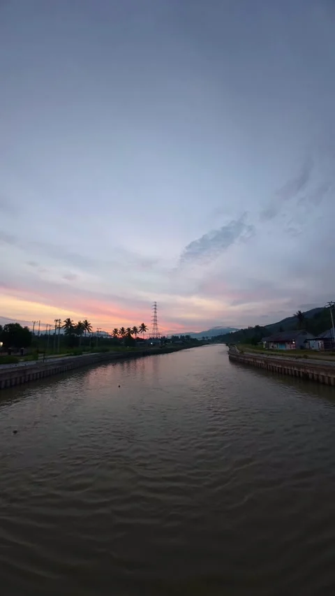 Timelapse of River at Sunset with Distant Hills Stock Footage 333039663
