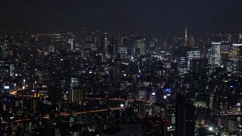 Timelapse of roads with passing vehicles with lights, during night, Tokyo Stock Footage 136115341