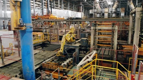 Timelapse of robotic arm, industrial transporting equipment at the factory 스톡 동영상 119600236