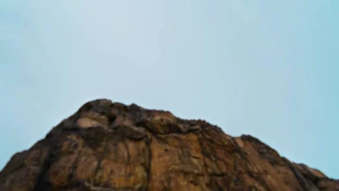 Timelapse rocky cliff mountain. Slider timelapse with rugged rock formation Stock Footage 339280861