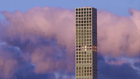 Timelapse of rolling clouds above Park Avenue skyscraper. Stock Footage 78815502