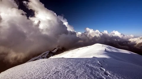 Timelapse of rolling clouds over Mardi himal ridge Stock Footage 261809624