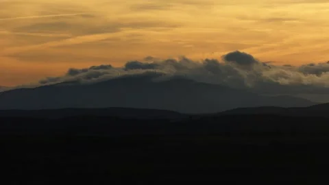 Timelapse Rolling clouds over mountain Stock Footage 333903538